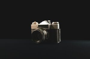 Vintage Zenit-E camera on dark background.