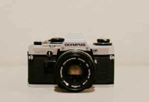 Vintage Olympus OM-10 film camera on display.