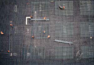 Aerial view of construction workers on site.