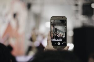 Capturing live performance on smartphone camera.