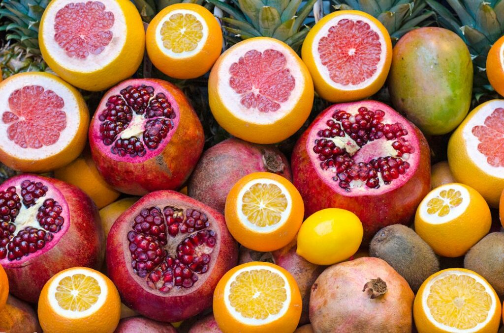 Assorted fresh citrus and pomegranates.